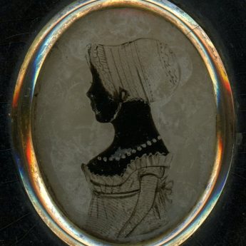 Charming silhouette of a child reverse painted on glass and backed with wax