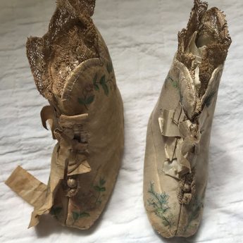 A pair of Georgian child's boots in hand-painted silk