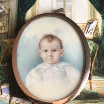 Miniature portrait of a young child signed by Gladys Colthurst