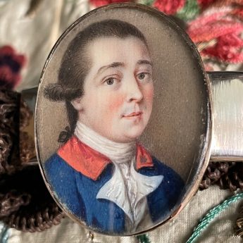 Miniature portrait of a gentleman set in a bracelet with a woven hair band
