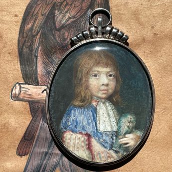 Miniature portrait of a child with a blue parrot
