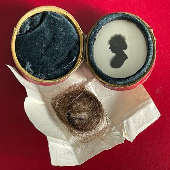 George Bruce, a rare pair of miniature silhouettes in travelling cases