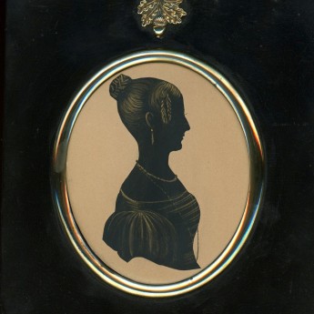 Cut and gilded silhouette of a lady by William Seville