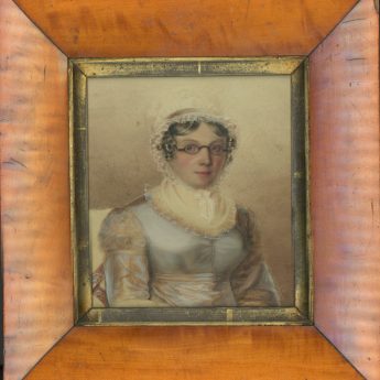 Watercolour portrait of a lady wearing spectacles