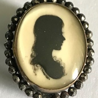 Painted silhouette brooch by Samuel Houghton