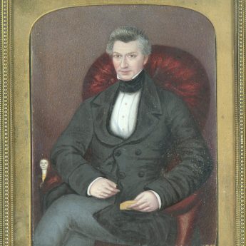 A pair of striking 3/4 length portrait miniatures in brass frames