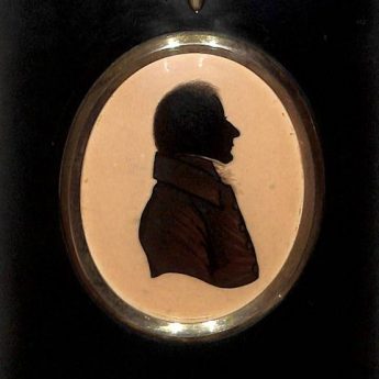 Silhouette reverse painted on convex glass, one of a pair