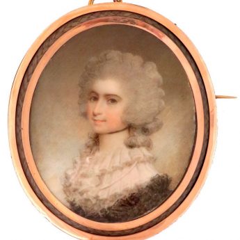 Miniature portrait of a lady painted by Samuel Shelley and set in a gold brooch with a plaited hair surround