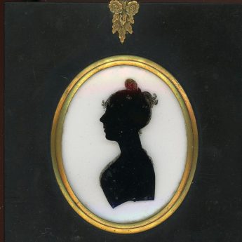 Silhouette reverse painted on glass by Charles Rosenberg and backed with the artist's trade label