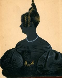 Painted silhouette of a lady wearing a beaded necklace