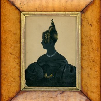 Painted silhouette of a lady wearing a beaded necklace