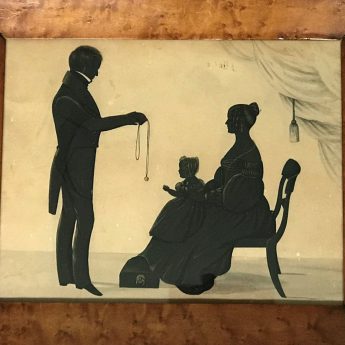 Painted and gilded silhouette conversation piece of a young family