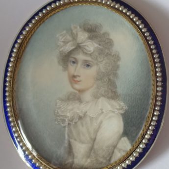 Miniature portrait of a young lady set in a gold frame with enamel and seed pearl surround, attributed to Scottish artist Archibald Skirving