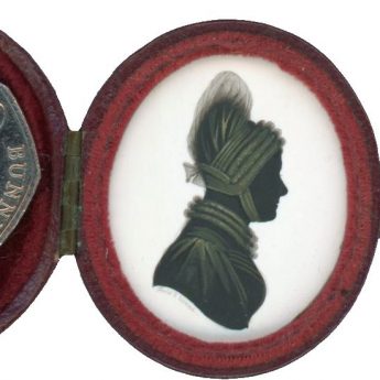 Small silhouette painted on ivory of a lady set within a travelling case