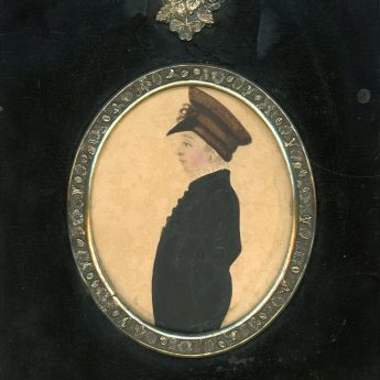 Miniature watercolour of a young boy in a peaked cap