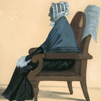 Cut silhouette of an elderly lady seated in an armchair