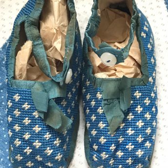 A delightful pair of blue shoes for a child