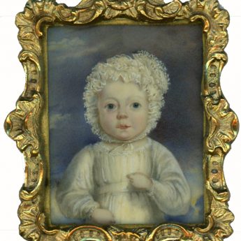 Miniature portrait of a child in a frilly cap, circa 1810