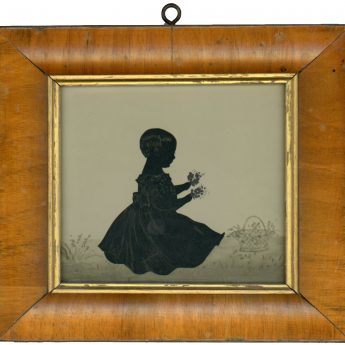 Cut silhouette of a child holding flowers