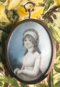 Miniature portrait of a young lady wearing pearl drop earrings