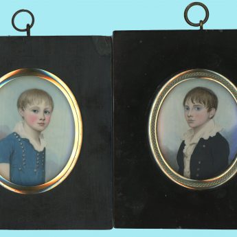 A pair of miniature portraits by Frederick Buck