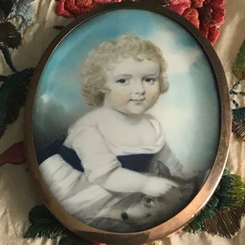 Miniature portrait of Rev. Thomas Blackburne as a child with his dog