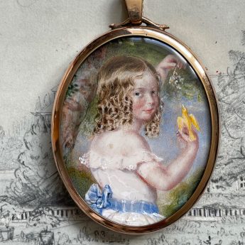 Miniature portrait of a child holding a yellow canary