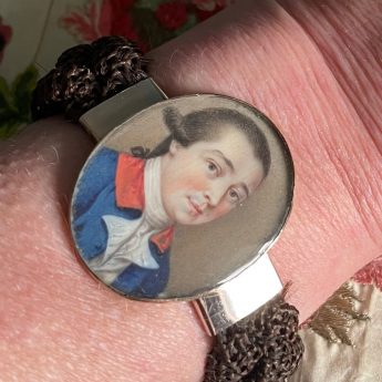 Miniature portrait of a gentleman set in a bracelet with a woven hair band