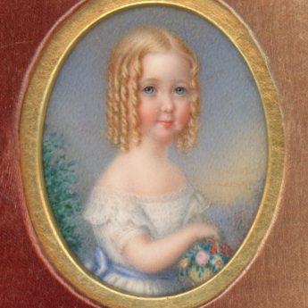 Miniature portrait of a child in a carved case