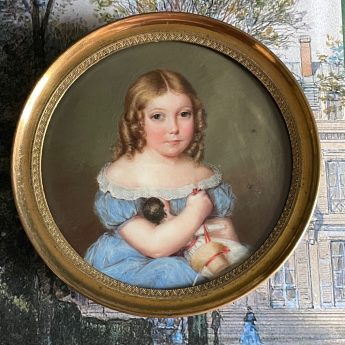 Miniature portrait of a girl with a doll by Fanny Arlaud