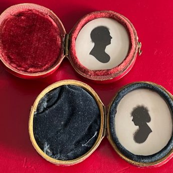 George Bruce, a rare pair of miniature silhouettes in travelling cases