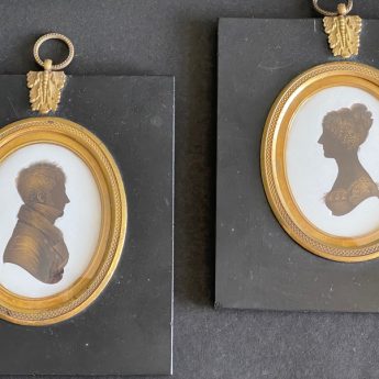 A fine pair of painted and gilded silhouettes by John Field, dated 1821