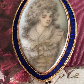 Miniature portrait of a Georgian lady in a navette-shaped brooch