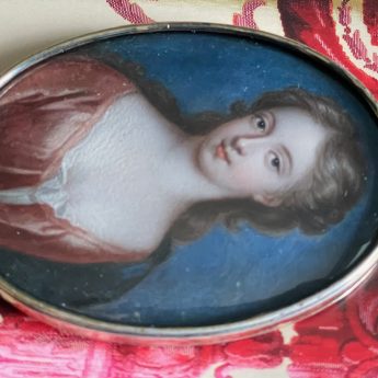 Miniature portrait of a lady in a coral dress, oil on copper