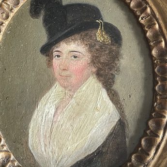Small oil on metal portrait of a lady wearing a riding habit