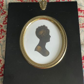 John Field, painted and gilded silhouette on plaster of a young lady