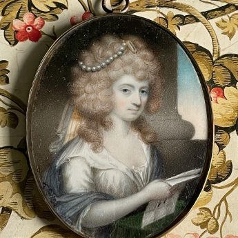 Joseph Saunders, a pair of portrait miniatures of a stylish couple