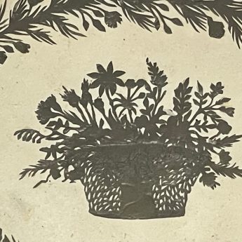 Cut paper basket of flowers
