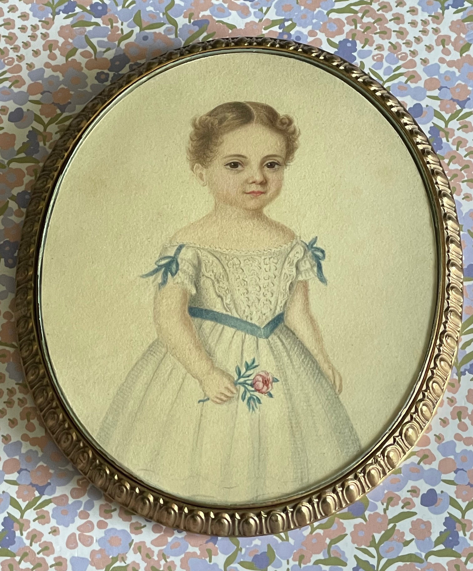 Miniature watercolour portrait of a little girl