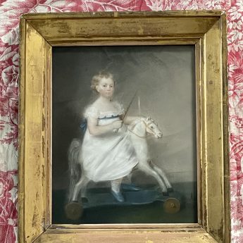 Ellen Sharples, pastel portrait of a child on a toy horse