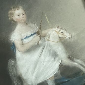 Ellen Sharples, pastel portrait of a child on a toy horse