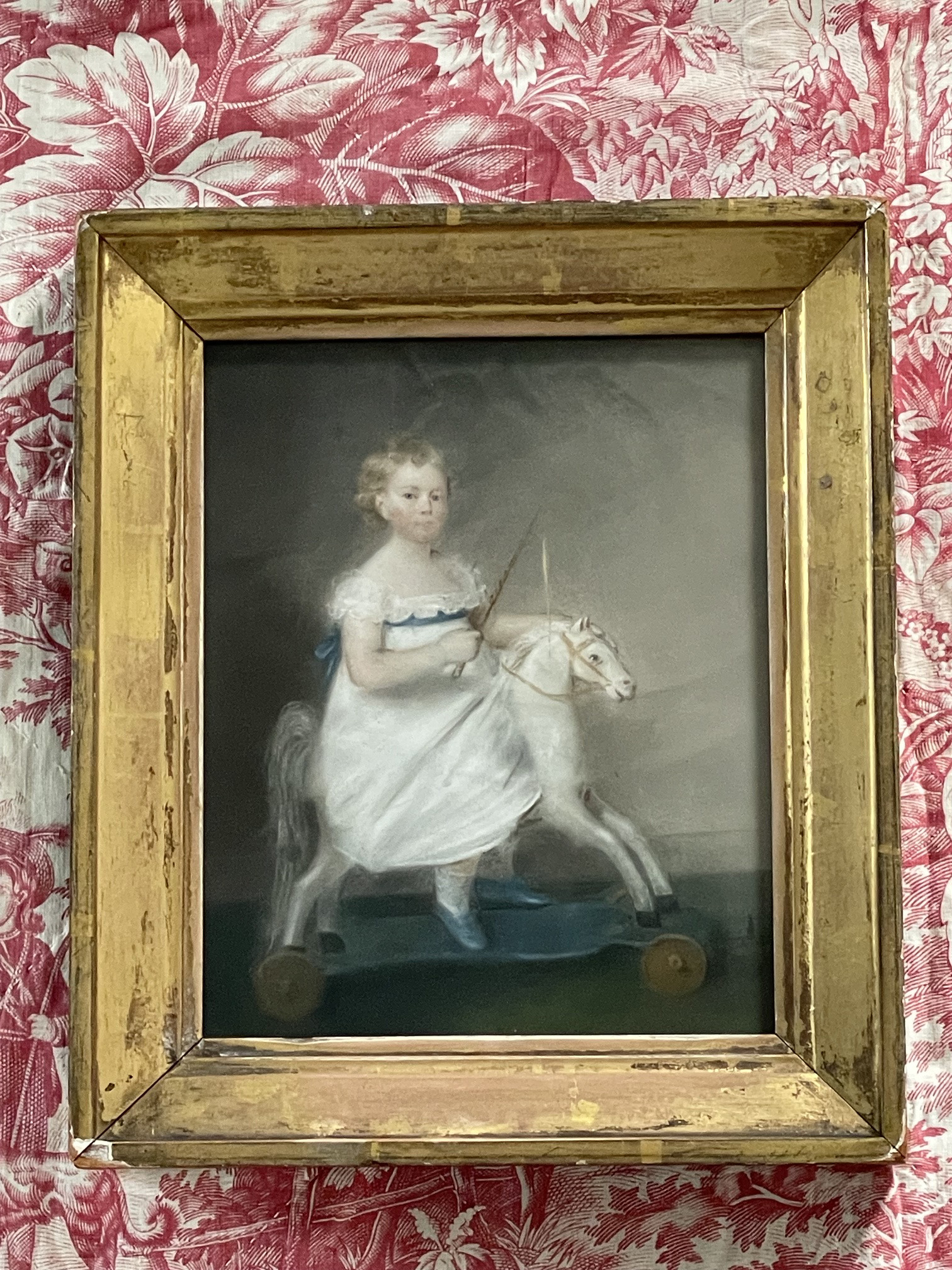 Ellen Sharples, pastel portrait of a child on a toy horse