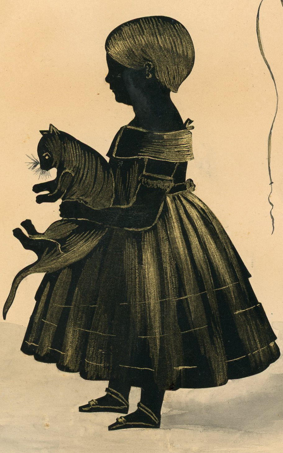 Painted and gilded silhouette of two children and a cat