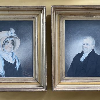 A pair of watrecolour portrait of a country squire and his wife