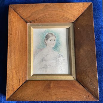 Watercolour and pencil portrait of a lady holding a tabby cat