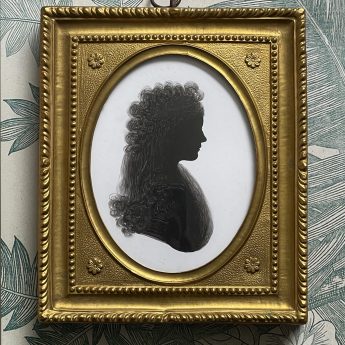 J. Thomason, painted silhouette of a young lady on plaster