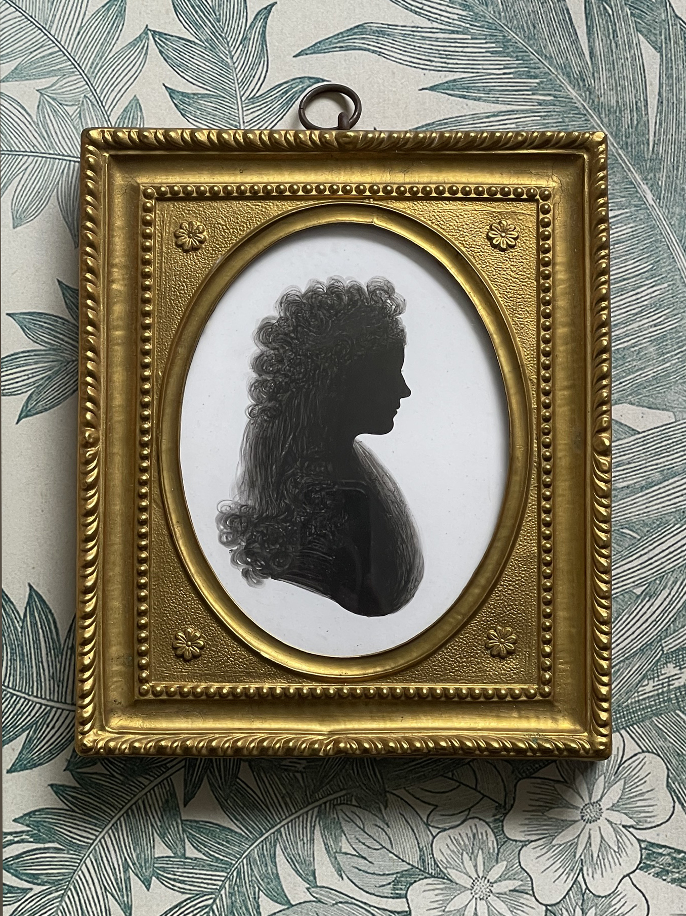 J. Thomason, painted silhouette of a young lady on plaster