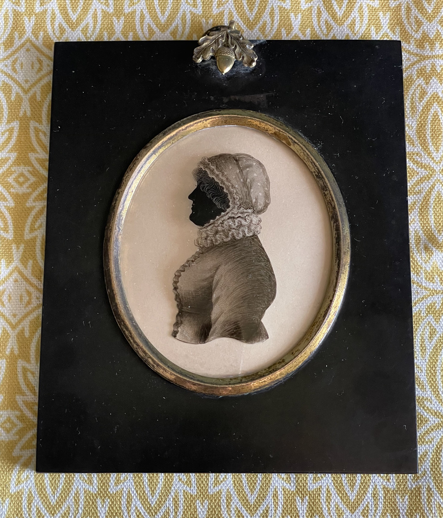 Hinton Gibbs, silhouette reverse painted on glass with a trade label