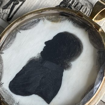 J. Thomason double-sided silhouette pendant
